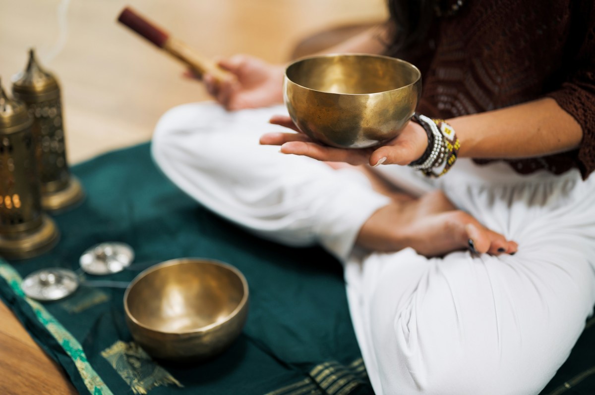Ancient Tibetan prayer wheels with sacred golden script